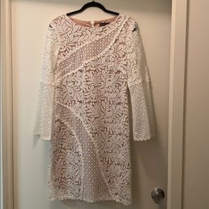White lined lace dress size 8. Never worn